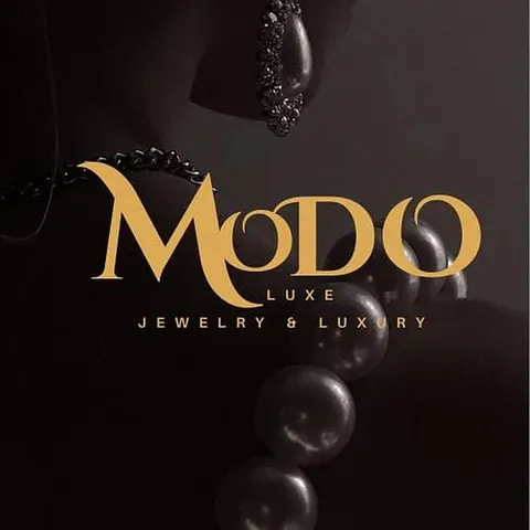 Logo design in Nairobi for Modo Luxe jewelry and luxury, in gold lettering on a dark background